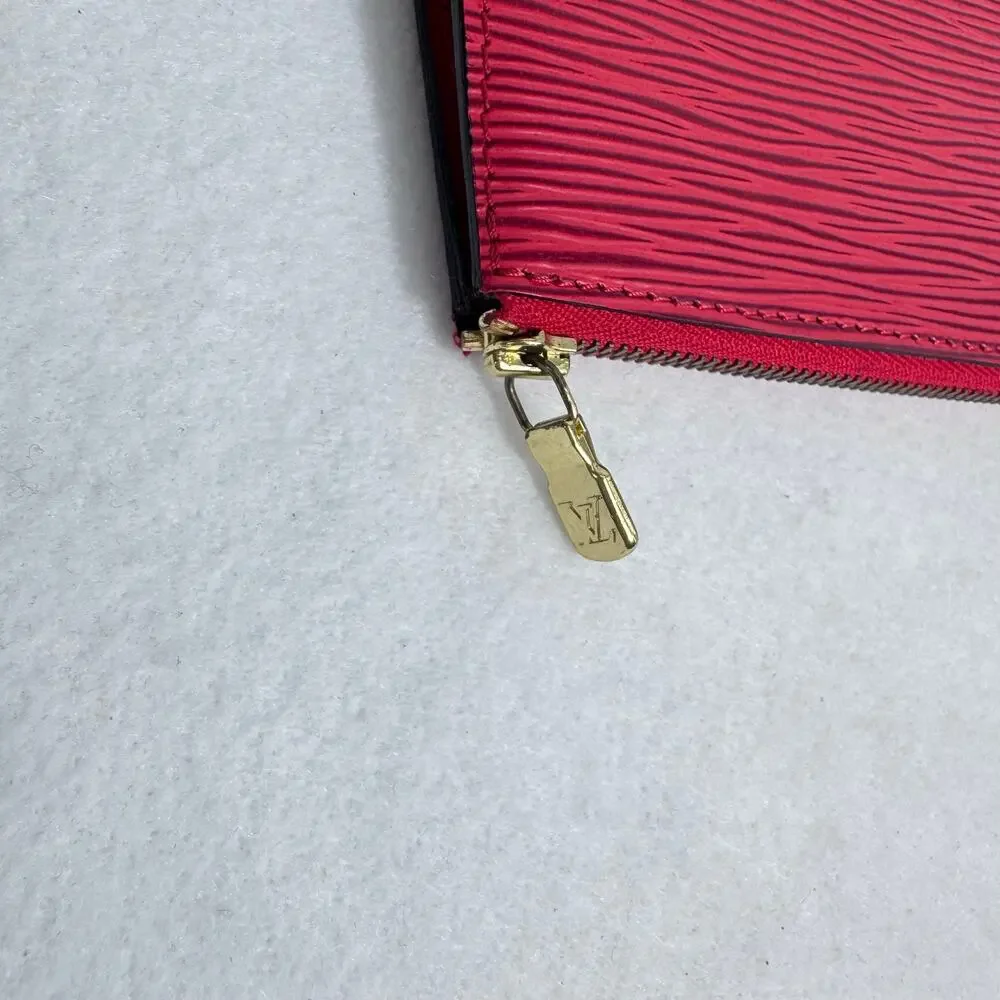 Louis Vuitton Epi Pochette Accessoires 24 Red wristlet gold hardware.